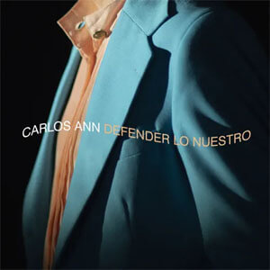 Disco Defender Lo Nuestro de Carlos Ann